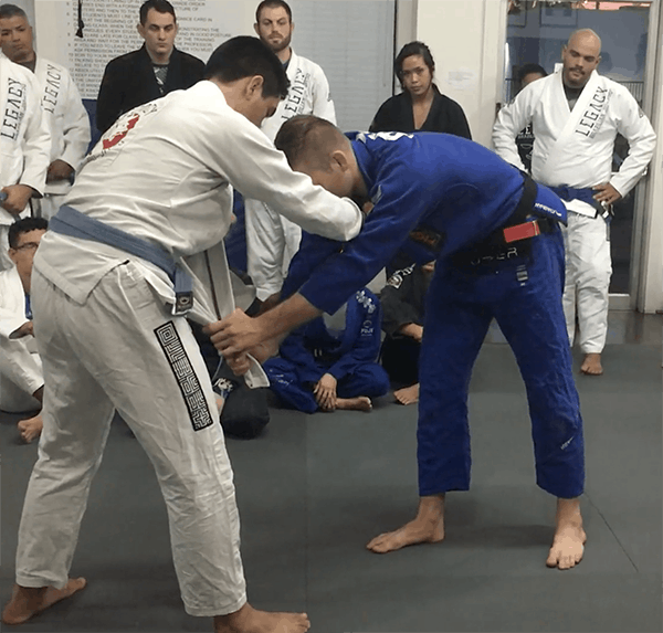 two handed grip on the lapel from standing